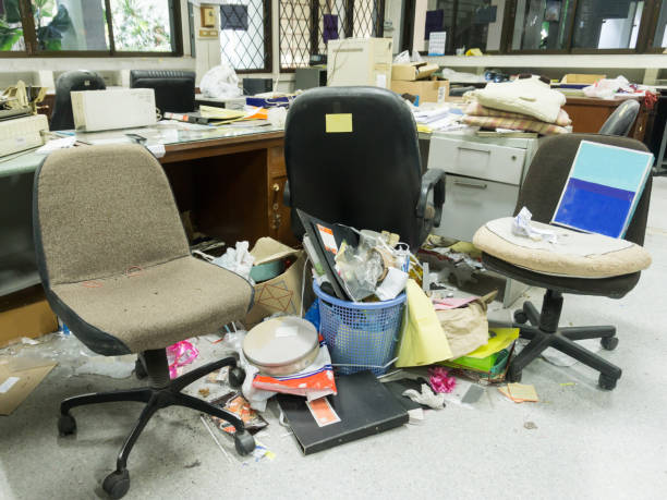 Dirty, messy and abandoned office, poor light